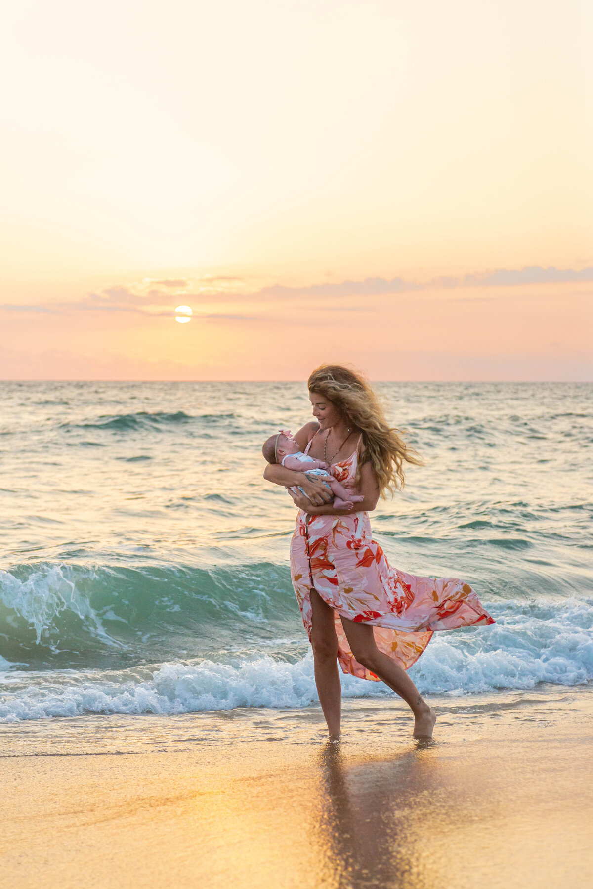 Mother and Newborn at Sunset