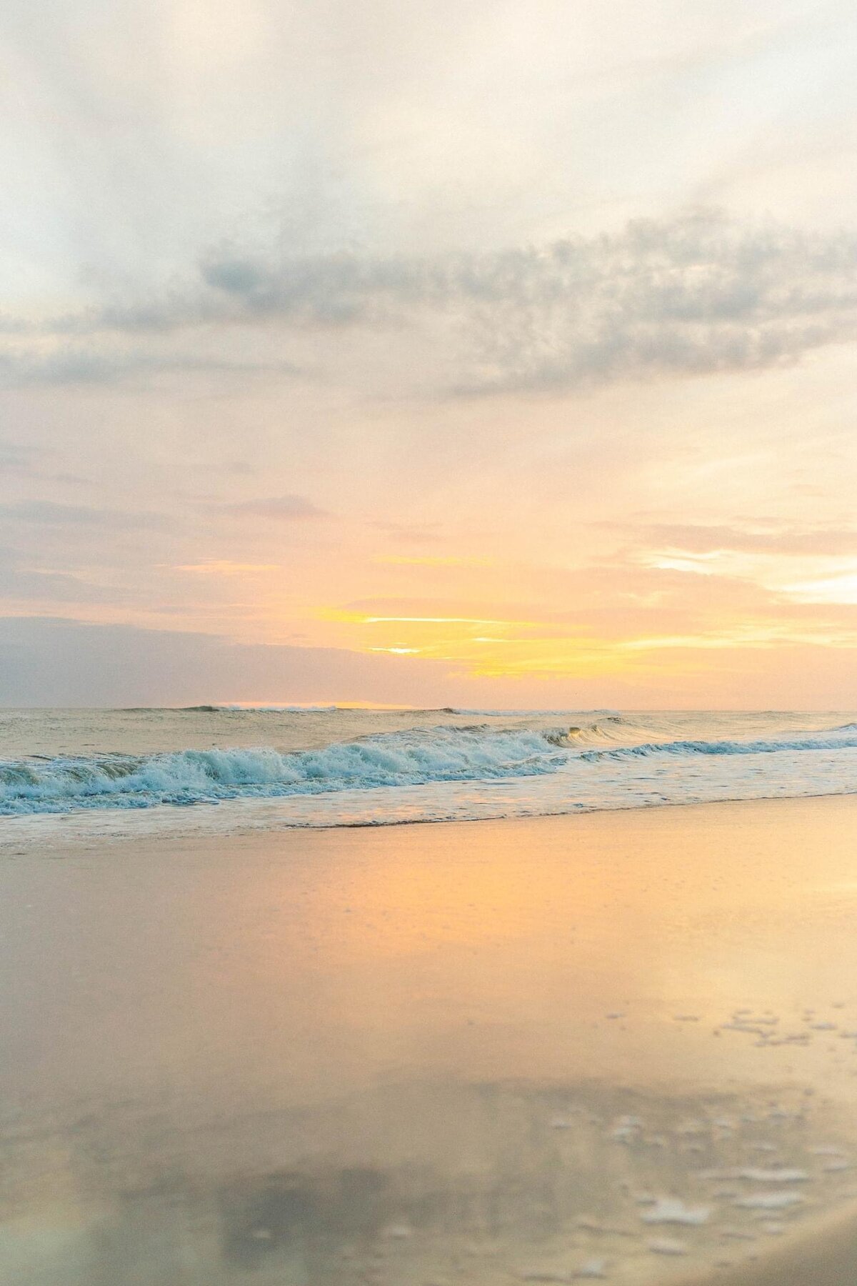 Pastel Sunset on the Waves