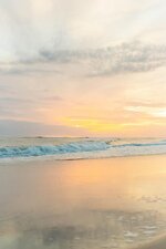 Pastel Sunset on the Waves