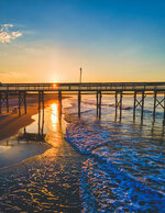 Sunrise Waves Beneath the Pier