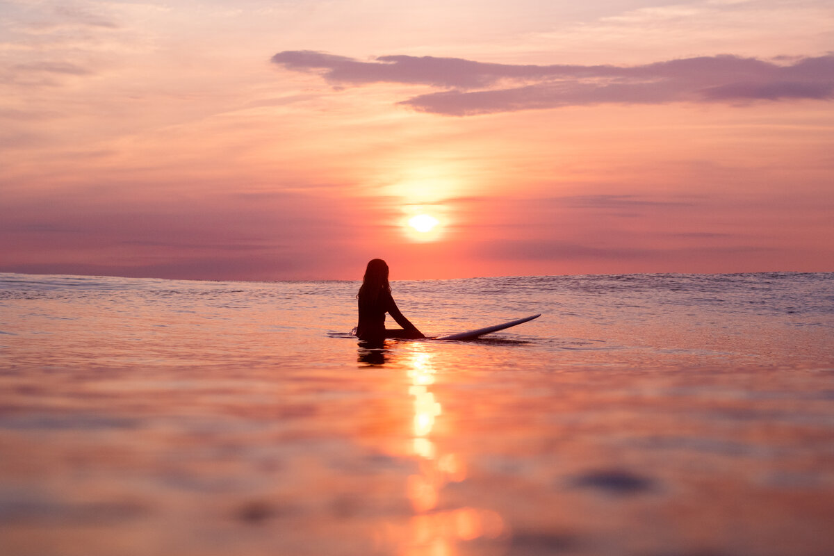 Surfer Girl at Sunset