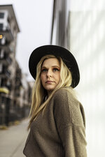 Street Portrait in a Black Hat
