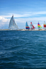 Sailboats Near Lighthouse