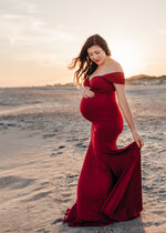 Maternity in Red at Sunset