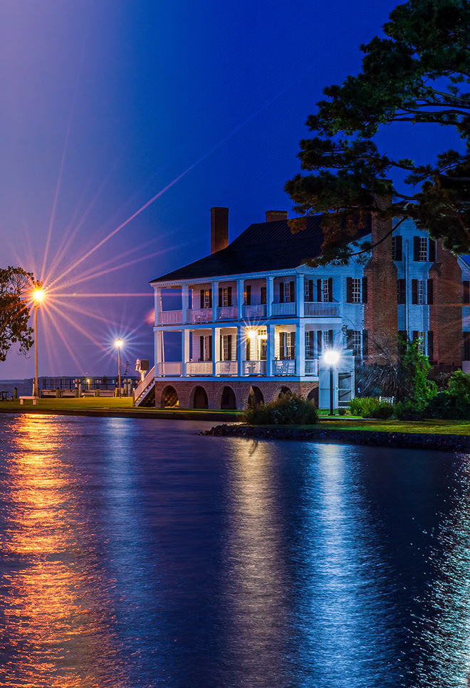 Historic Waterfront Manor at Dusk